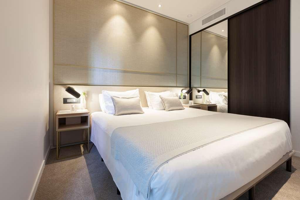 One Global Resorts Green Square Sidney Oda fotoğraf A bedroom at the hotel