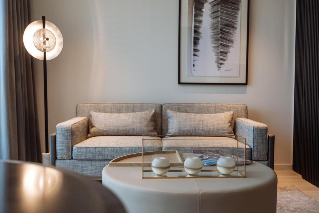 One Global Resorts Green Square Sidney Dış mekan fotoğraf A living room at the Ritz-Carlton, DIFC